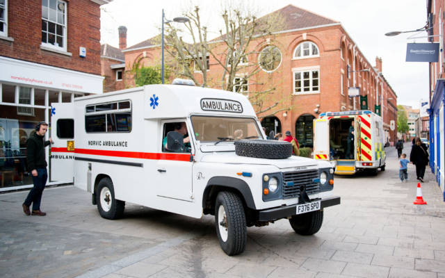 Photo from NNF13 show The Kindness of Strangers, two ambulances parked outside Norwich Playhouse.