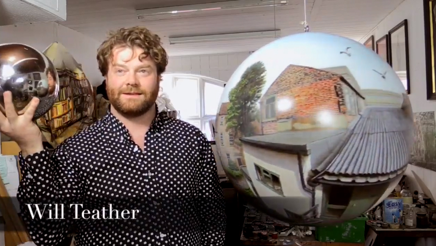 Video thumbnail: Will Teather standing next to one of his painted Globes holding up a reflective sphere