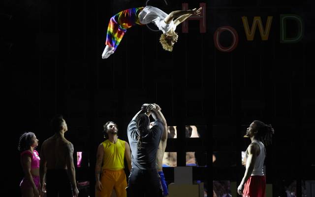 A circus performer doing a backflip.